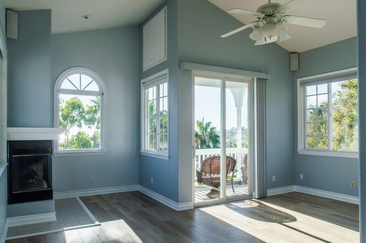 trendy-modern-interior-living-room-with-blue-walls-white-windows_181624-18642